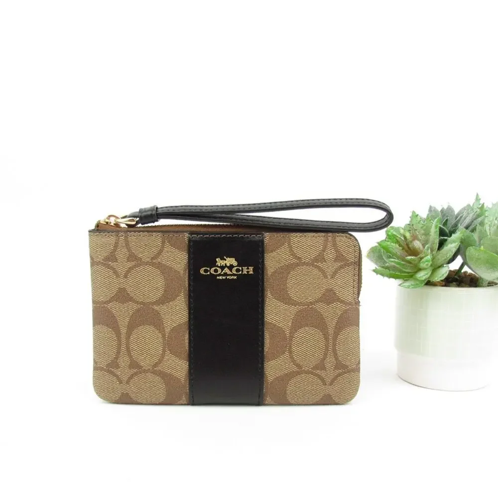 Coach Corner Zip Wristlet In Signature Canvas